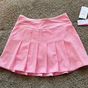 Lilly Pulitzer Pink Checkered Luxletic skirt.
Size 2.